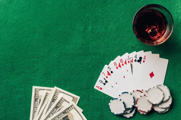 Live baccarat studio with professional croupier dealing cards in real-time